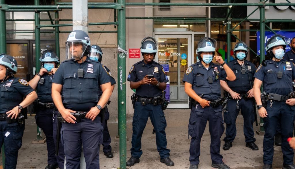 masked police standing together